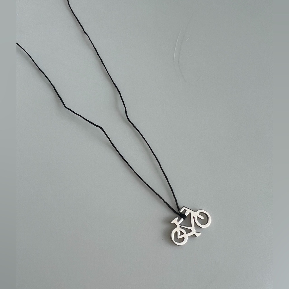 Sterling silver bicycle necklace with black thread